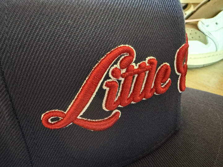 LS raised letter cap